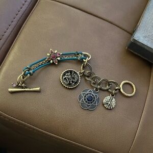 Turquoise cord and gold tone metal by Lucky Brand